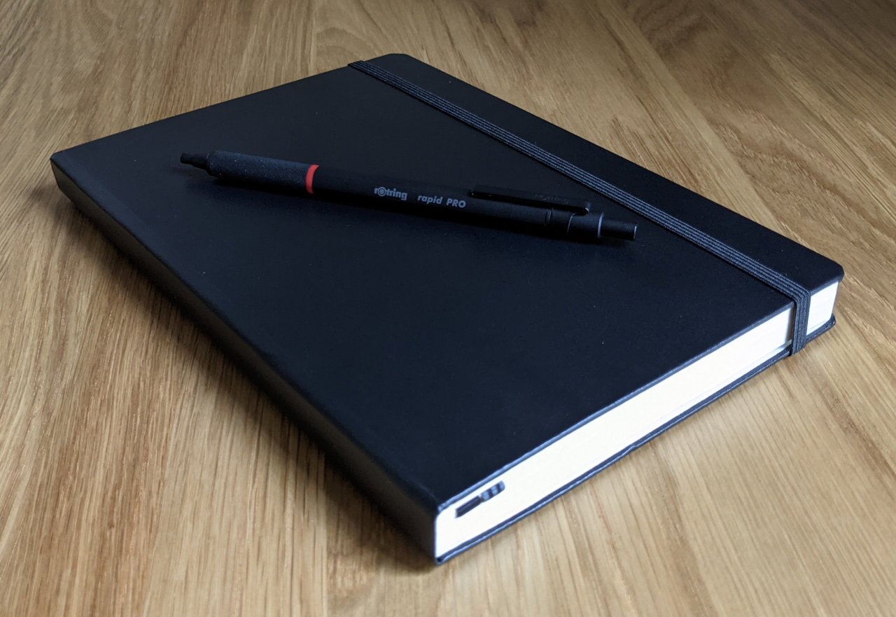 Notebook and Pen
